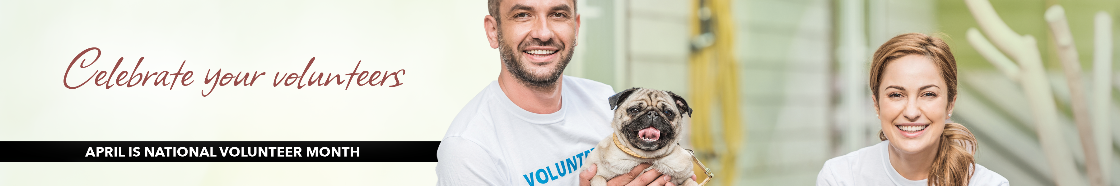Two people with a dog, celebrating National Volunteer Month, with text overlay.